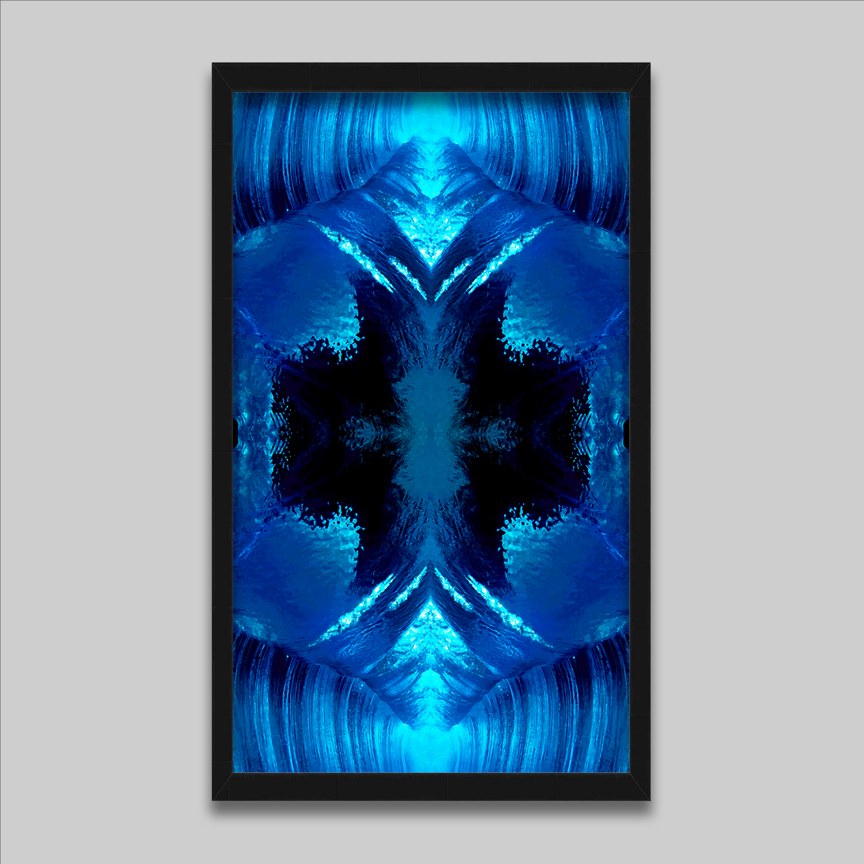 John DeTemple blue kaleidoscopic abstract artwork in a black frame.