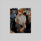 Print by James Alpert: Behind that Door (Mac Miller NPR); tattooed man in an orange cap in a studio.
