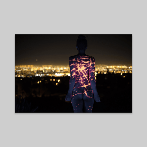 Original City Lights by Paul Roustan: back-view figure with glowing circuit patterns over a cityscape.