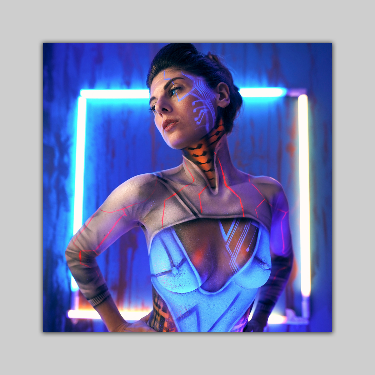 Cyberpunk print by VEFA Gallery featuring a woman with neon blue facial markings under blue neon lights.