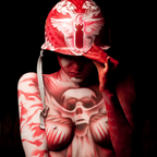 Photograph War and Peace by VEFA Gallery: red body paint with white bird motif on helmet