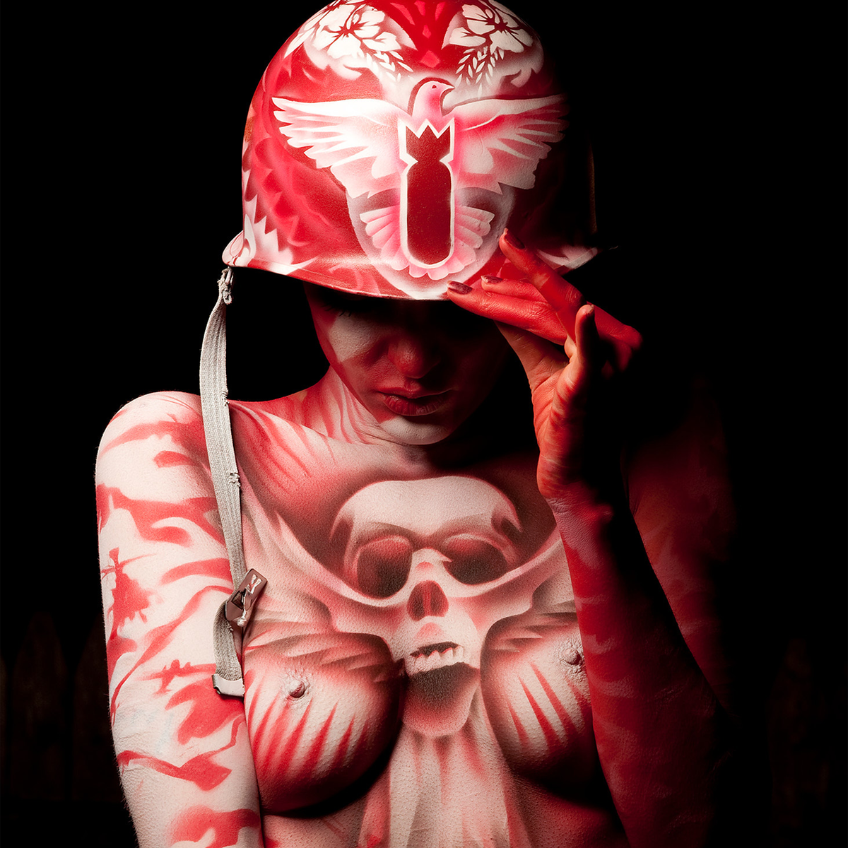 Photograph War and Peace by VEFA Gallery: red body paint with white bird motif on helmet