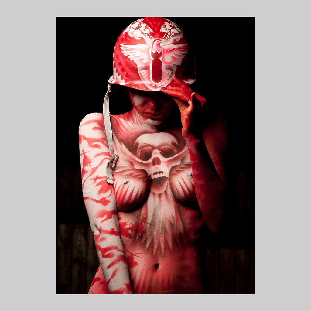 War and Peace, photograph by VEFA Gallery; red body-painted figure with a white decorative helmet.