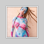 Watercolor print by Paul Roustan, body-painted portrait in blue and pink against a beige wall.